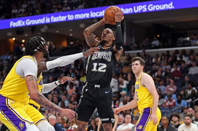 Ja Morant #12 of the Memphis Grizzlies takes a shot during the first half against the Los Angeles Lakers at FedExForum on February 28, 2023 in Memphis, Tennessee (Photo by Justin Ford/Getty Images)