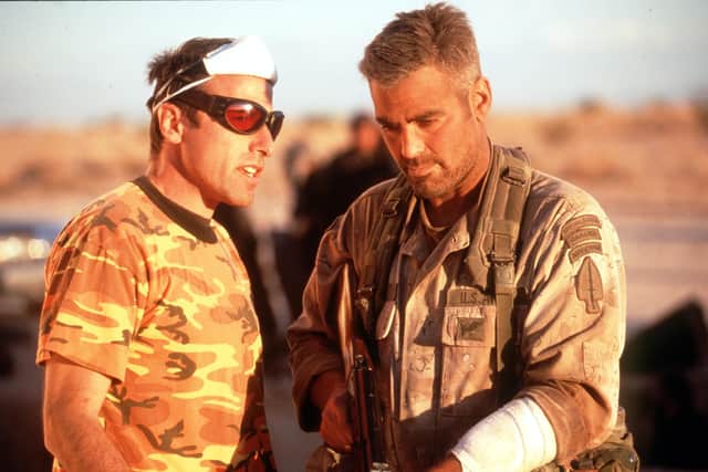 Director, David O. Russell And George Clooney In "Three Kings." '99 Wb And Village Roadshow Film Limited (Photo By Getty Images)