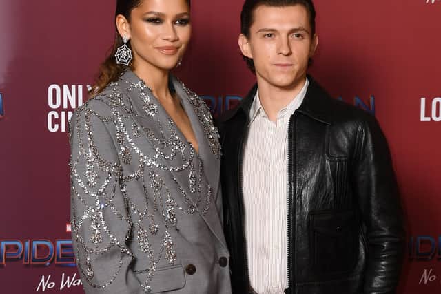 LONDON, ENGLAND - DECEMBER 05: (L-R) Zendaya and Tom Holland attend a photocall for "Spiderman: No Way Home" at The Old Sessions House on December 05, 2021 in London, England. (Photo by Gareth Cattermole/Getty Images)