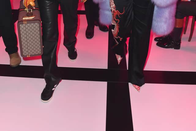 ASAP Rocky and Rihanna are seen at the Gucci show during Milan Fashion Week Fall/Winter 2022/23 on February 25, 2022 in Milan, Italy. (Photo by Jacopo M. Raule/Getty Images for Gucci)