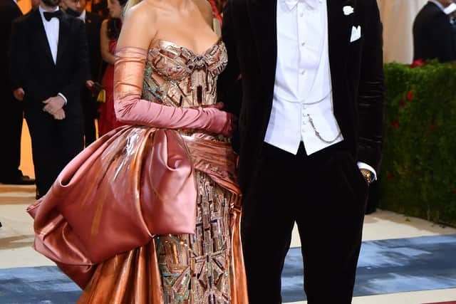 US actress Blake Lively and husband Canadian-US actor Ryan Reynolds arrive for the 2022 Met Gala at the Metropolitan Museum of Art on May 2, 2022, in New York. - The Gala raises money for the Metropolitan Museum of Art's Costume Institute. The Gala's 2022 theme is "In America: An Anthology of Fashion". (Photo by ANGELA  WEISS / AFP) (Photo by ANGELA  WEISS/AFP via Getty Images)