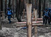 A UN-backed inquiry has concluded that Russia has committed war crimes in Ukraine, with evidence such as the mass grave sites in Bucha and Izyum. (Credit: Getty Images)