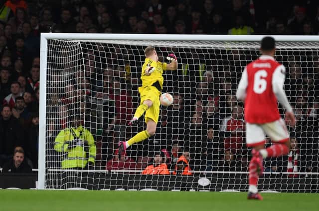 Arsenal goalkeeper Aaron Ramsdale is beaten by Pedro Goncalves for Sporting’s goal during the UEFA Europa League round of 16 leg two match between Arsenal FC and Sporting CP at Emirates Stadium on March 16, 2023 in London, England. (Photo by Stuart MacFarlane/Arsenal FC via Getty Images)