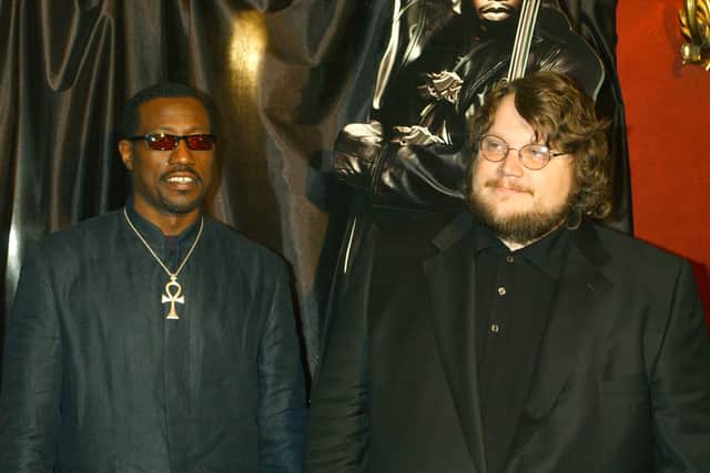 Actor Wesley Snipes (L) and director Guillermo del Toro attends the premiere of the movie Blade II April 18, 2002 in Madrid, Spain. (Photo by Carlos Alvarez/Getty Images)