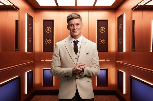 Rise and Fall contestant Jack, pictured in the gold elevator (Credit: Channel 4)