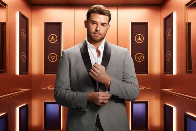 Rise and Fall contestant James, pictured in the gold elevator (Credit: Channel 4)