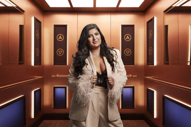 Rise and Fall contestant Ramona, pictured in the gold elevator (Credit: Channel 4)