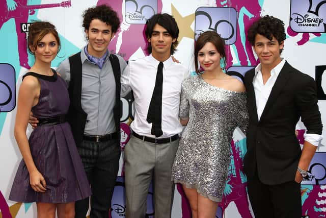 (L-R) Alyson Stoner, Kevin Jonas, Joe Jonas, Demi Lovato and Nick Jonas arrive at the European TV premiere of 'Camp Rock' at The Royal Festival Hall on September 10, 2008 in London, England.  (Photo by Gareth Cattermole/Getty Images)
