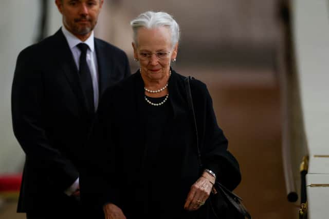 Queen Margrethe of Denmark and her oldest son Crown Prince Frederik of Denmark paid their respects as they viewed the coffin of Queen Elizabeth II lying in state at Westminster Hall. Photograh by Getty