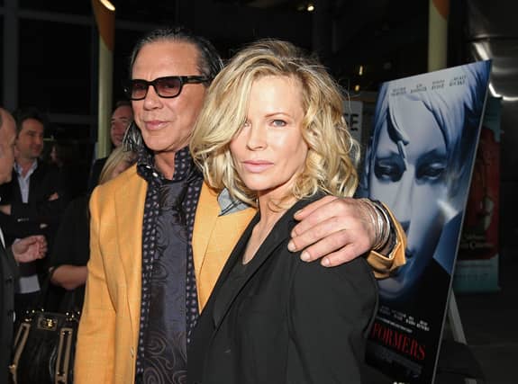 Actor Mickey Rourke and actress Kim Basinger arrive at the premiere of Senator Entertainment's "The Informers" held at the Arclight Theaters on April 16, 2009 in Hollywood, California. (Photo by Alberto E. Rodriguez/Getty Images)