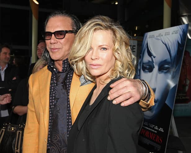 Actor Mickey Rourke and actress Kim Basinger arrive at the premiere of Senator Entertainment's "The Informers" held at the Arclight Theaters on April 16, 2009 in Hollywood, California.  (Photo by Alberto E. Rodriguez/Getty Images)