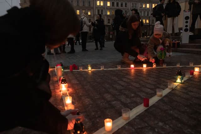 Yesterday, Ukrainians gathered in Kyiv on the anniversary of the Mariupol Theatre Airstrike. Credit: Getty Images