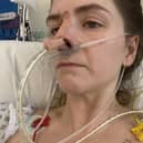 Beki Reilly in a hospital bed following emergency surgery. Picture:  Irwin Mitchell / SWNS