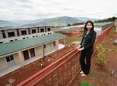 Home Secretary Suella Braverman tours a building site on the outskirts of Kigali during her visit to Rwanda, to see the houses being constructed to potentially house deported migrants from the UK. Picture date: Saturday March 18, 2023. Credit: PA