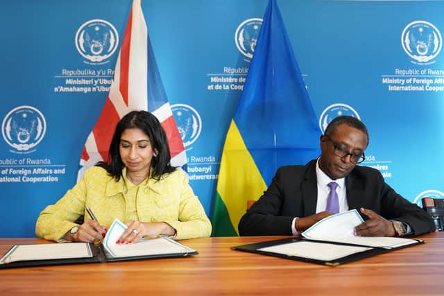 Home Secretary Suella Braverman and Rwandan minister for foreign affairs and international co-operation, Vincent Biruta sign an enhanced partnership deal in Kigali, during her visit to Rwanda (Photo: PA/Stefan Rousseau)