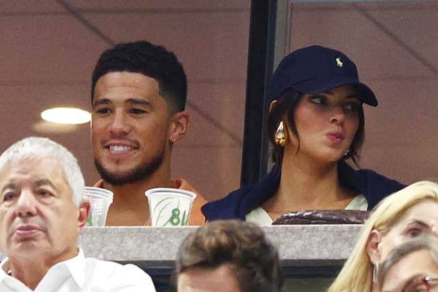  Devin Booker and Model Kendall Jenner look on during the Men's Singles Final match between Casper Ruud of Norway and Carlos Alcaraz of Spain on Day Fourteen of the 2022 US Open at USTA Billie Jean King National Tennis Center on September 11, 2022 in the Flushing neighborhood of the Queens borough of New York City. (Photo by Elsa/Getty Images)
