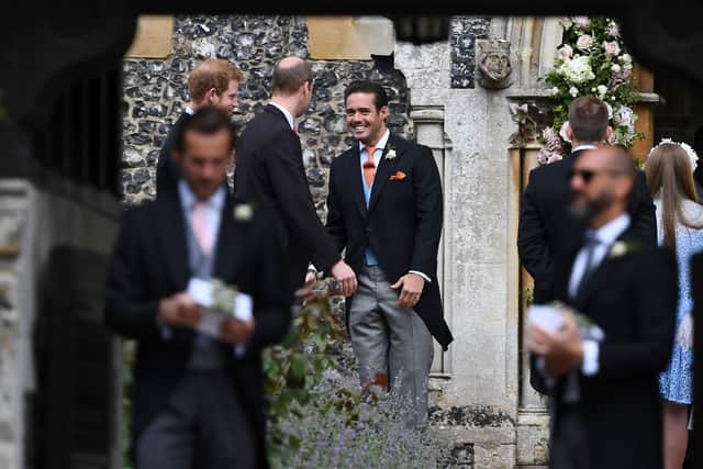 Spencer Matthews greets Prince William and Prince Harry at his brother's wedding. (Getty Images)