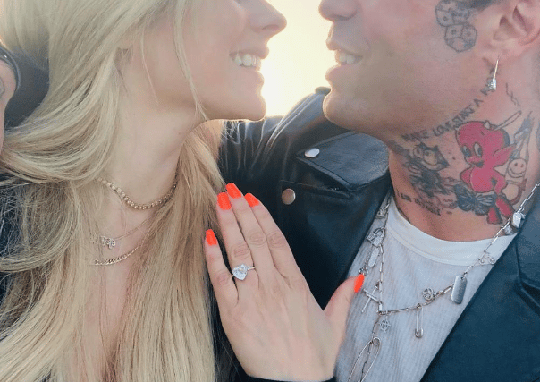Avril Lavigne and Mod Sun when they became engaged in 2022. Mod proposed with a heart shaped engagement ring as a gift for Avril. Instagram/Avril Lavigne. 
