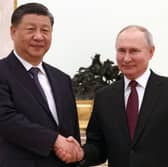 Xi Jinping met with Vladimir Putin at the Kremlin in Moscow (Credit: Getty Images)