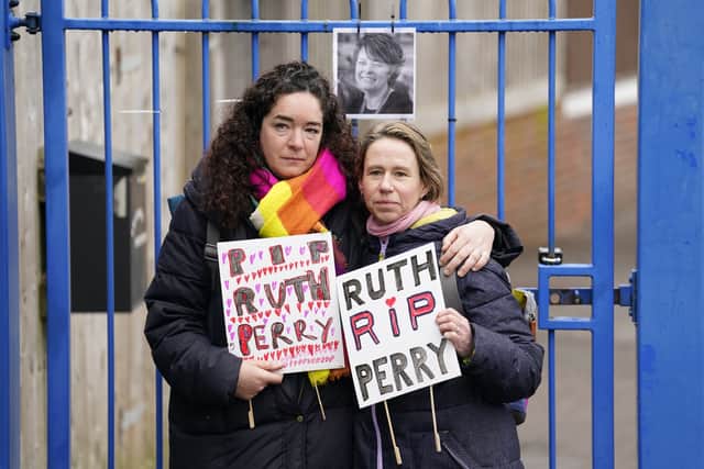 Ellen (left) and Liz outside the gates to John Rankin Schools in Newbury, Berkshire. Credit: PA