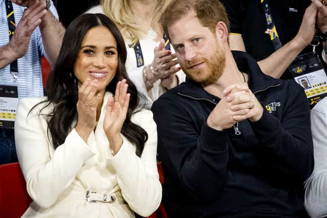 The Duke and Duchess of Sussex, Prince Harry and his wife Meghan Markle visit the sitting volleyball section of the fifth edition of the Invictus Games in The Hague on April 17, 2022. - The Invictus Games is an international sporting event for servicemen and veterans who have been psychologically or physically injured in their military service.  - Netherlands OUT (Photo by Sem van der Wal / ANP / AFP) / Netherlands OUT (Photo by SEM VAN DER WAL/ANP/AFP via Getty Images)