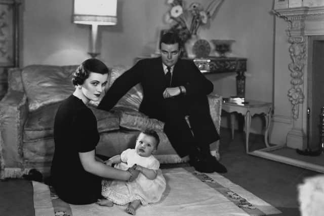 English socialite Margaret Sweeny (1912 - 1993), at home with her husband, Charles Sweeny (1910 - 1993), and their daughter, Frances, 28th January 1938. Margaret Sweeny later married a second time and became Duchess of Argyll. In 1958, Frances married Charles Manners, 10th Duke of Rutland and became known as Frances Manners, Duchess of Rutland. (Photo by Sasha/Hulton Archive/Getty Images)