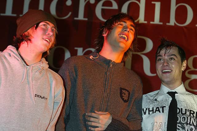 Busted attends the annual Regent Street Christmas Lights switching-on ceremony, having performed live, in Regent Street on November 7, 2004 in London. (Photo by Jo Hale/Getty Images)