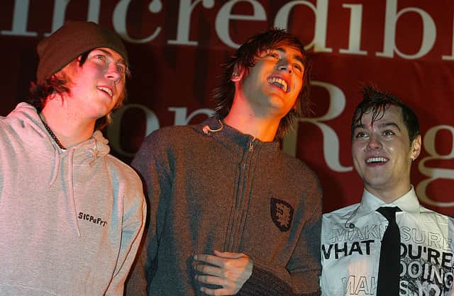 Busted attends the annual Regent Street Christmas Lights switching-on ceremony, having performed live, in Regent Street on November 7, 2004 in London. (Photo by Jo Hale/Getty Images)