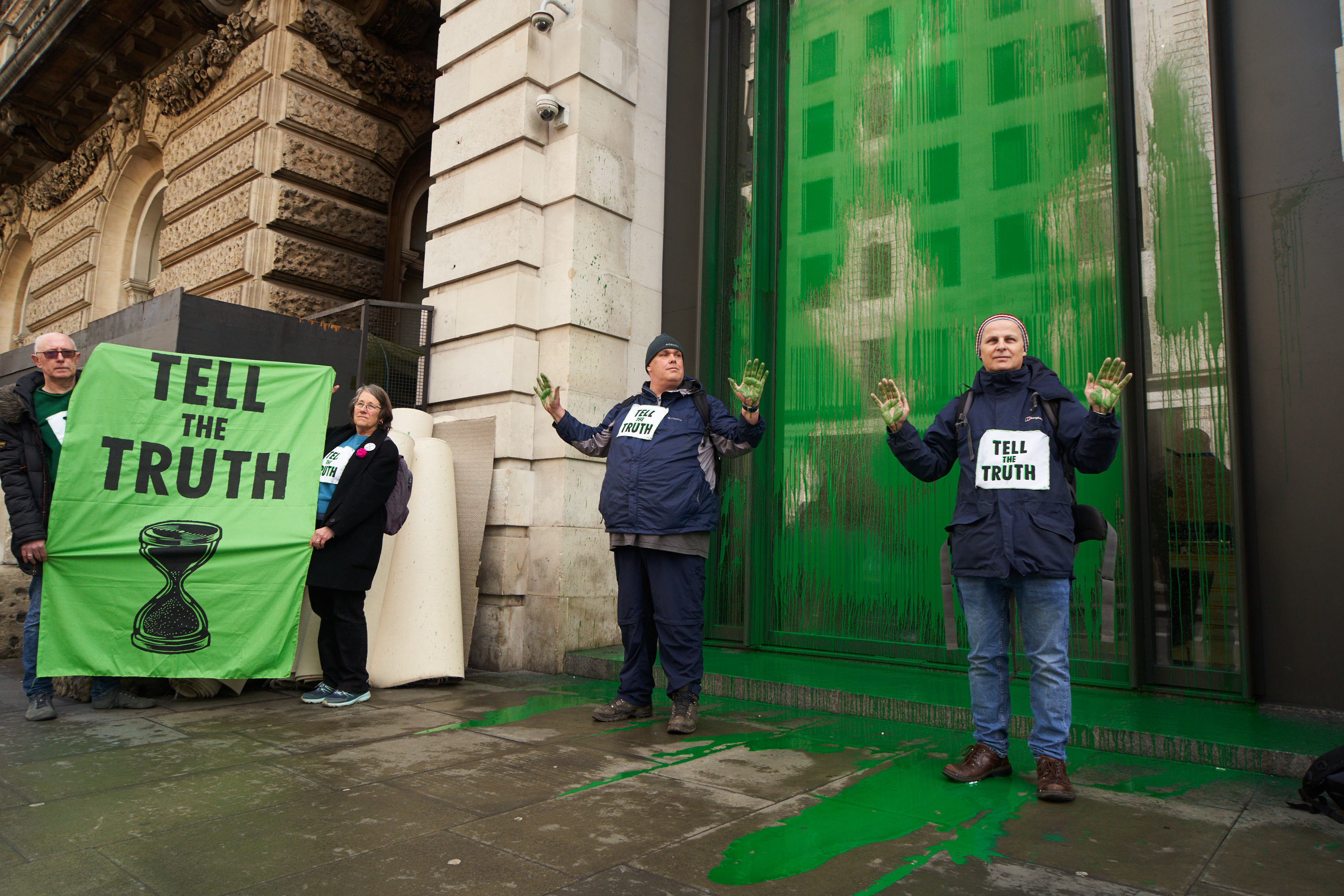 Seven arrested after Extinction Rebellion spray green pain over The Telegraph, The Sun and Daily Mail offices