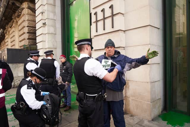 Seven Extinction Rebellion activists have been arrested after throwing green paint at several newspaper offices in London. (Image by XR UK) 