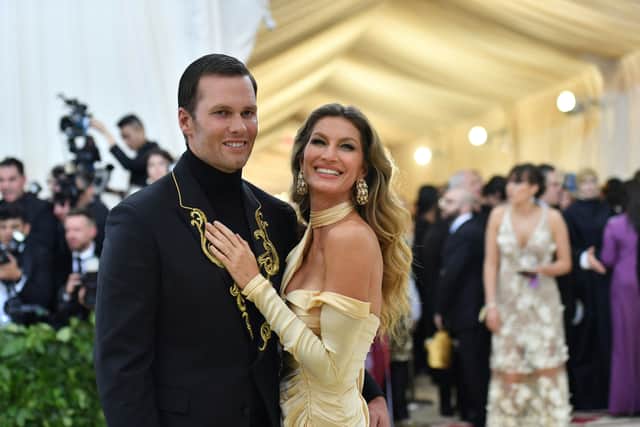 Tom Brady (L) and Gisele Bundchen arrive for the 2018 Met Gala on May 7, 2018, at the Metropolitan Museum of Art in New York. (Photo by Angela WEISS / AFP) / The erroneous mention[s] appearing in the metadata of this photo by Angela WEISS has been modified in AFP systems in the following manner: [Gisele Bundchen] instead of [Gisele Brundchen]. Please immediately remove the erroneous mention[s] from all your online services and delete it (them) from your servers. If you have been authorized by AFP to distribute it (them) to third parties, please ensure that the same actions are carried out by them. Failure to promptly comply with these instructions will entail liability on your part for any continued or post notification usage. Therefore we thank you very much for all your attention and prompt action. We are sorry for the inconvenience this notification may cause and remain at your disposal for any further information you may require. (Photo by ANGELA WEISS/AFP via Getty Images)