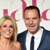 Martin Lewis (R) and wife, Lara, attend the ITV Gala at London Palladium on November 19, 2015 in London, England. (Photo by Stuart C. Wilson/Getty Images)
