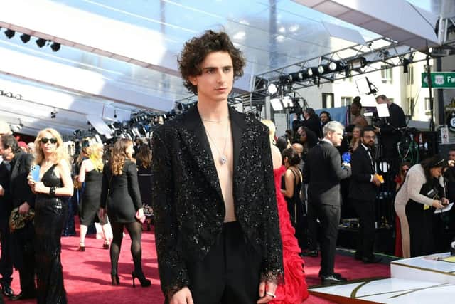 Timothée Chalamet went shirtless to the 2022 Oscars. Photograph by Getty
