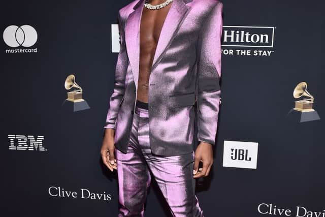 Lil Nas X shirtless at the  Pre-GRAMMY Gala this year. Photograph by Getty