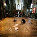 Conservators carry out restoration of Westminster Abbey's Cosmati Pavement on May 6, 2008 in London, England (Credit: Getty Images)
