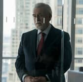 Brian Cox as Logan Roy in Succession Season 3, looming menacingly behind a glass door (Credit: HBO)