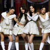 South Korean girl group Red Velvet perform at the 11th Gaon Chart Music Awards in Seoul on January 27, 2022. (Photo by JUNG YEON-JE/AFP via Getty Images)