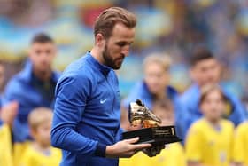 Harry Kane is given the England golden boot trophy