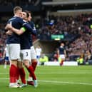 McTominay and Robertson celebrate McTominay’s second and Scotland’s third goal against Cyprus