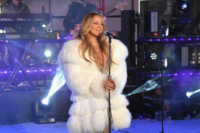 Mariah Carey performs at the Dick Clark's New Year's Rockin' Eve with Ryan Seacrest 2018 on December 31, 2017 in New York City.  (Photo by Nicholas Hunt/Getty Images for dick clark productions)