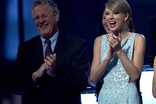 ARLINGTON, TX - APRIL 19:  Scott Kingsley Swift (L) and his daughter, honoree Taylor Swift, attend the 50th Academy of Country Music Awards at AT&T Stadium on April 19, 2015 in Arlington, Texas.  (Photo by Ethan Miller/Getty Images for dcp)