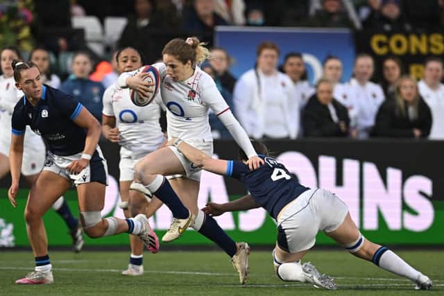 England’s Abby Dow breaks away during first round against Scotland