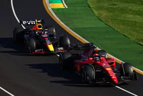 Charles Leclerc leads Max Verstappen in 2022 Grand Prix
