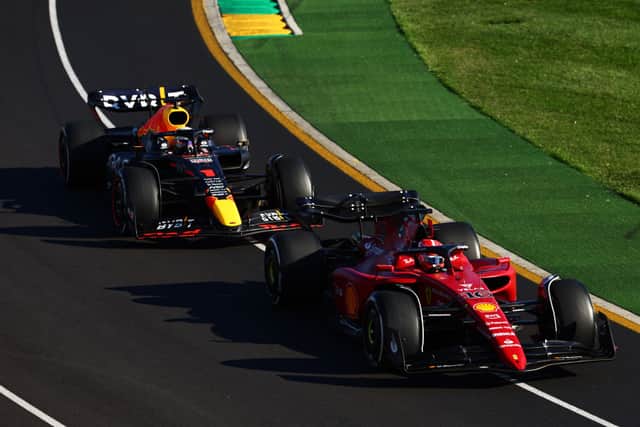 Charles Leclerc leads Max Verstappen in 2022 Grand Prix