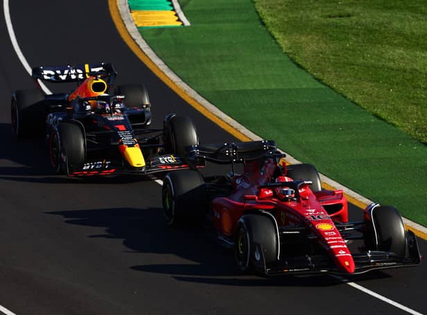 Charles Leclerc leads Max Verstappen in 2022 Grand Prix