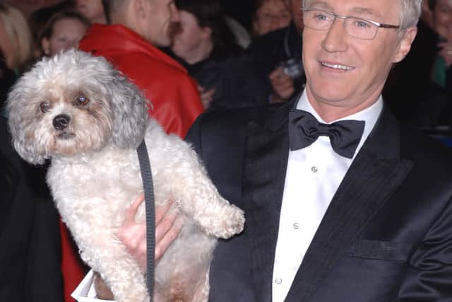 Paul O’Grady and his dog Buster arriving for the National Television Awards 2005 (NTA), at the Royal Albert Hall, central London. (Photo: PA/Steve Parsons)