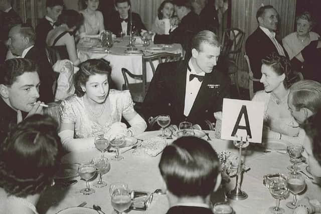 The then Princess Elizabeth socialises with her partner, Prince Philip, at The Dorchester's dining room (Credit: Dorchester Collection)
