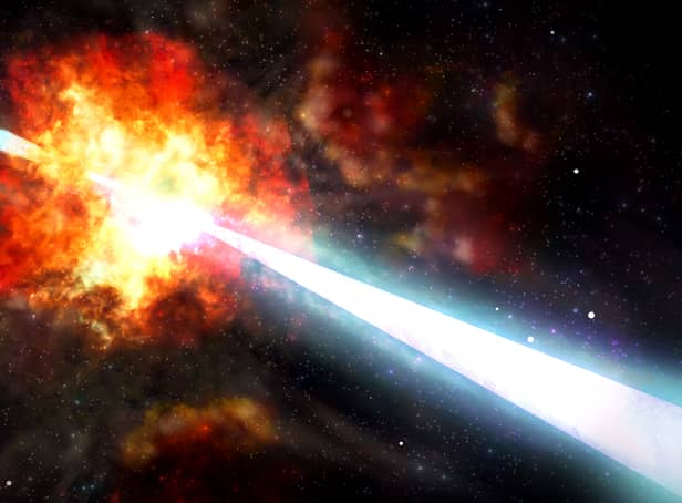 Artist’s impression of the beam of intense radiation produced by the cosmic explosion thought to be the brightest of all time