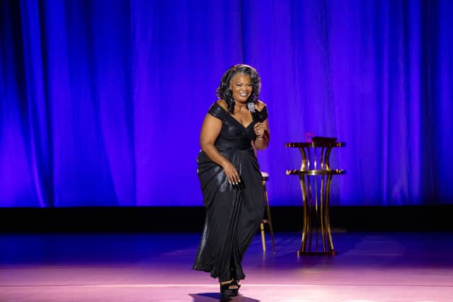 Mo'Nique performing standup in My Name is Mo'Nique (Credit: John Washington Jr./Netflix)