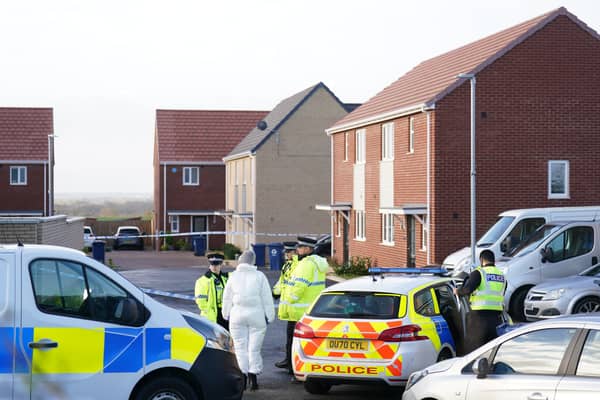 Police at the scene in Meridian Close, Bluntisham, where the body of a 32-year-old man was found (Photo: PA)